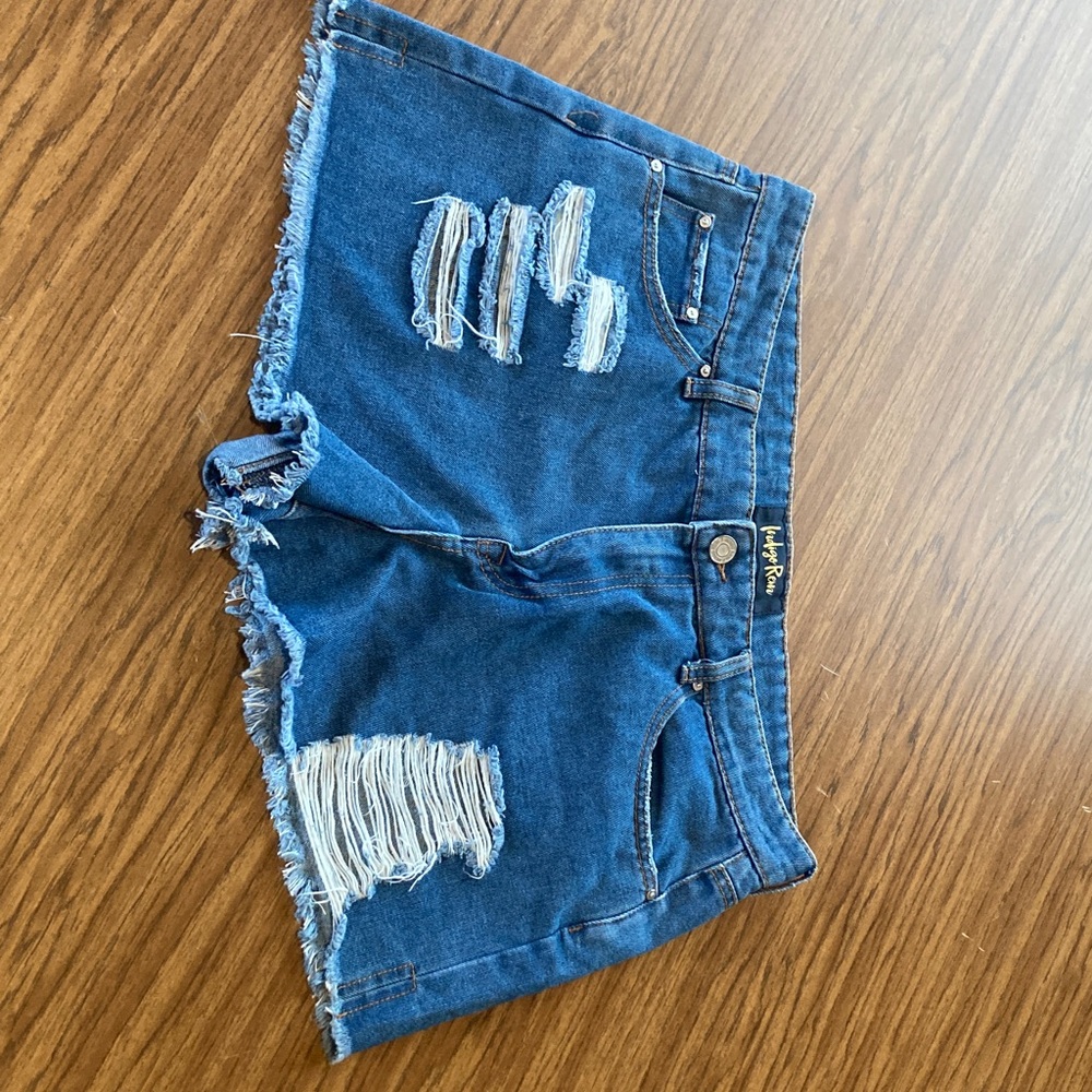 Ripped Blue Jean Shorts